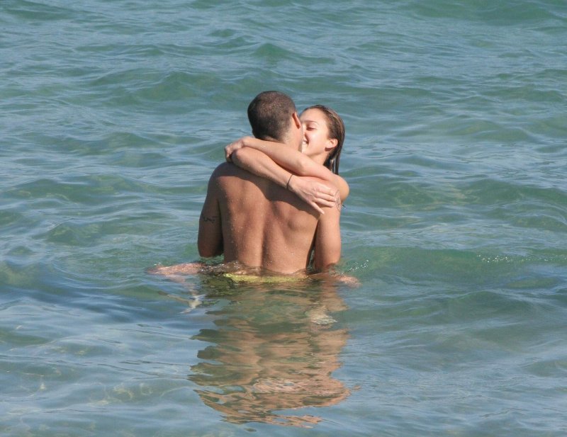 Couples on a nudist beach