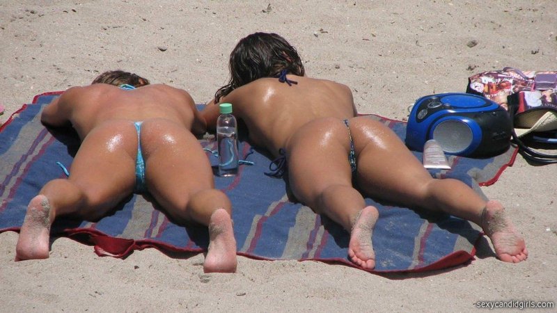 Women's naked priests on the beach