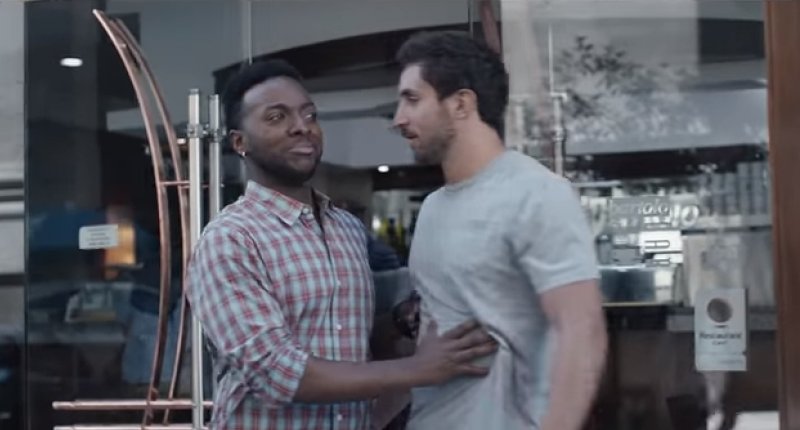 A person hugs by the shoulders