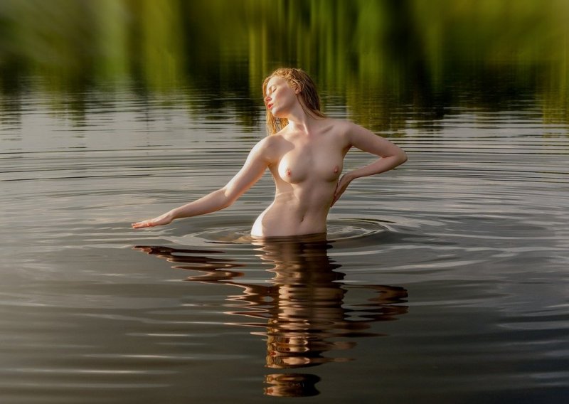 Artistic nude in water