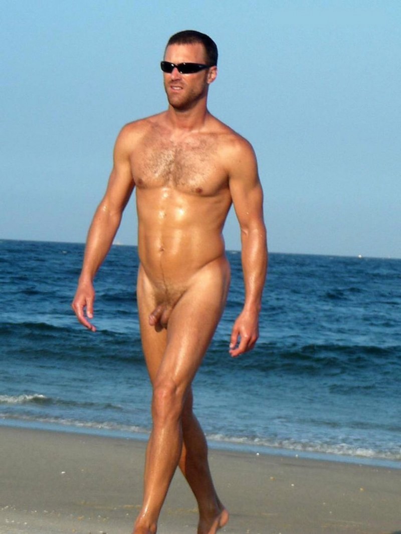 Naked pumped up guys on the beach