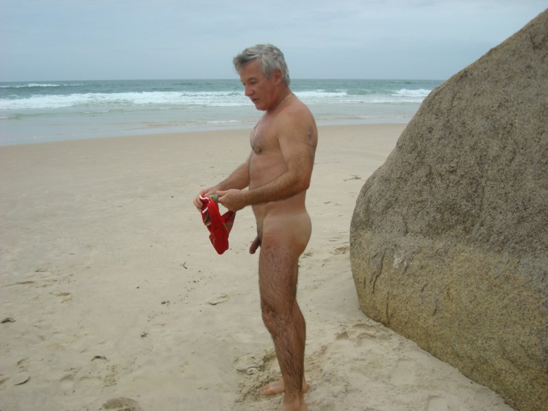 Naked guys fuck on the beach on the beach