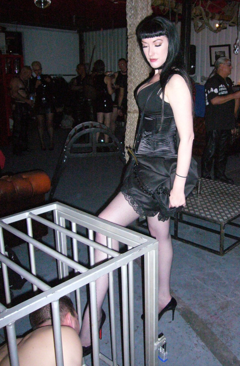 Girl in the dog cage