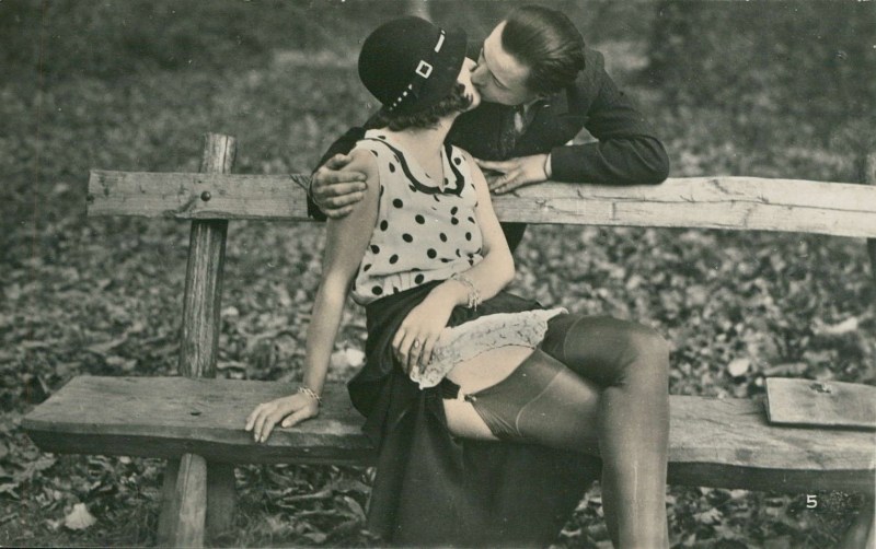 Girl surrounded by men