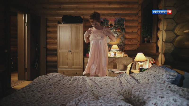 Olga Pogodina in a night shirt