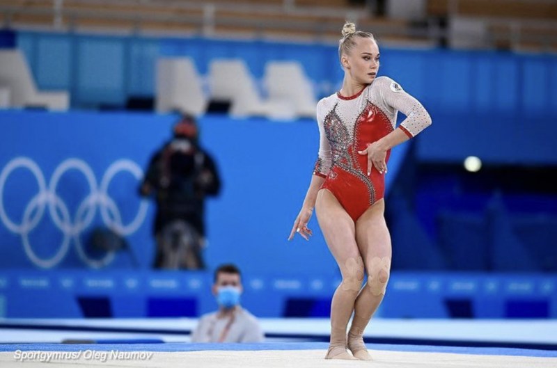 Naked gymnast on a rope