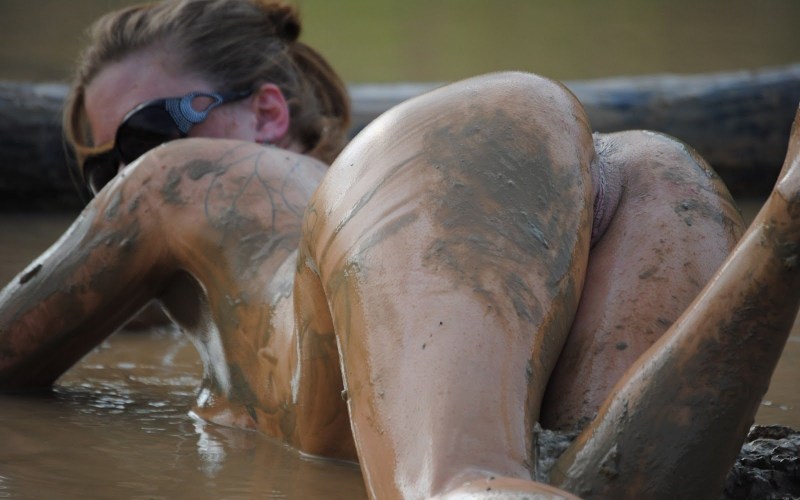 Girl with big tits in mud