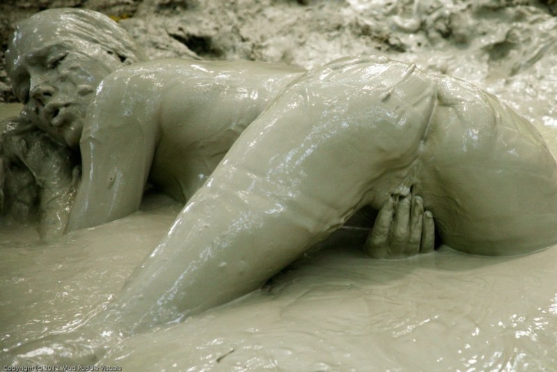 Naked swimming in the mud