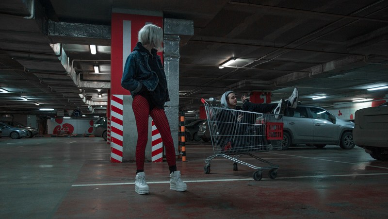 Girls in a boat with extended legs