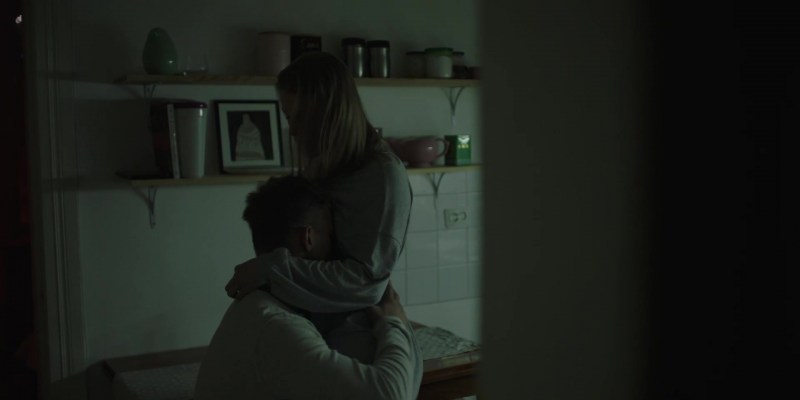 Naked swimmers dressed women