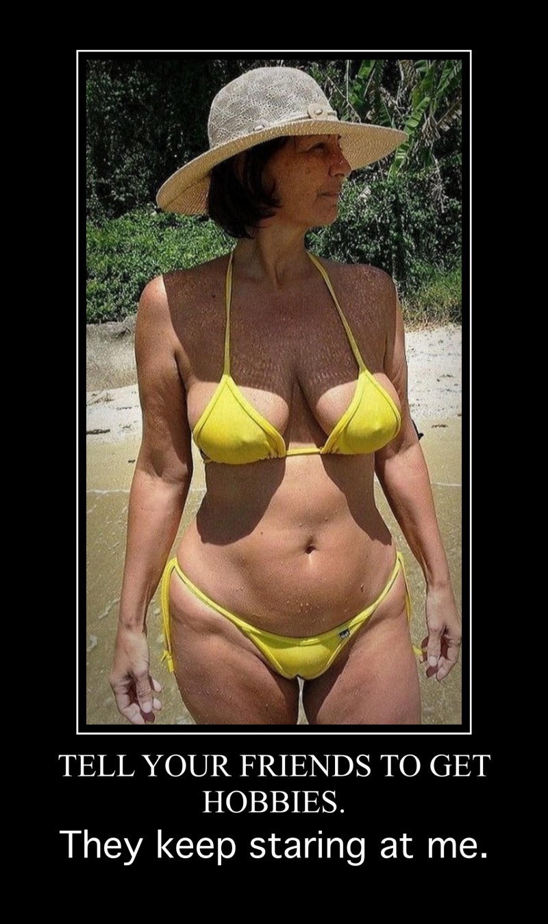 Naked mature in a micro bikini