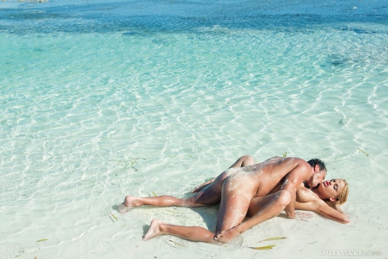 Beautiful naked pairs on the beach