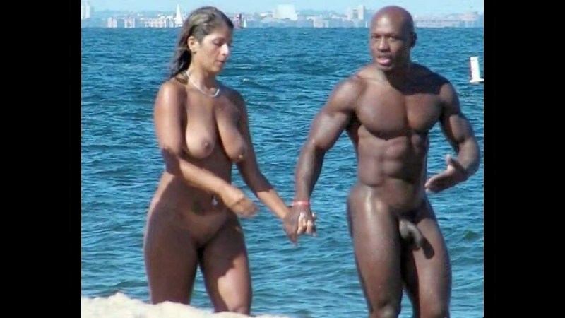 Naked white women with blacks on the beach