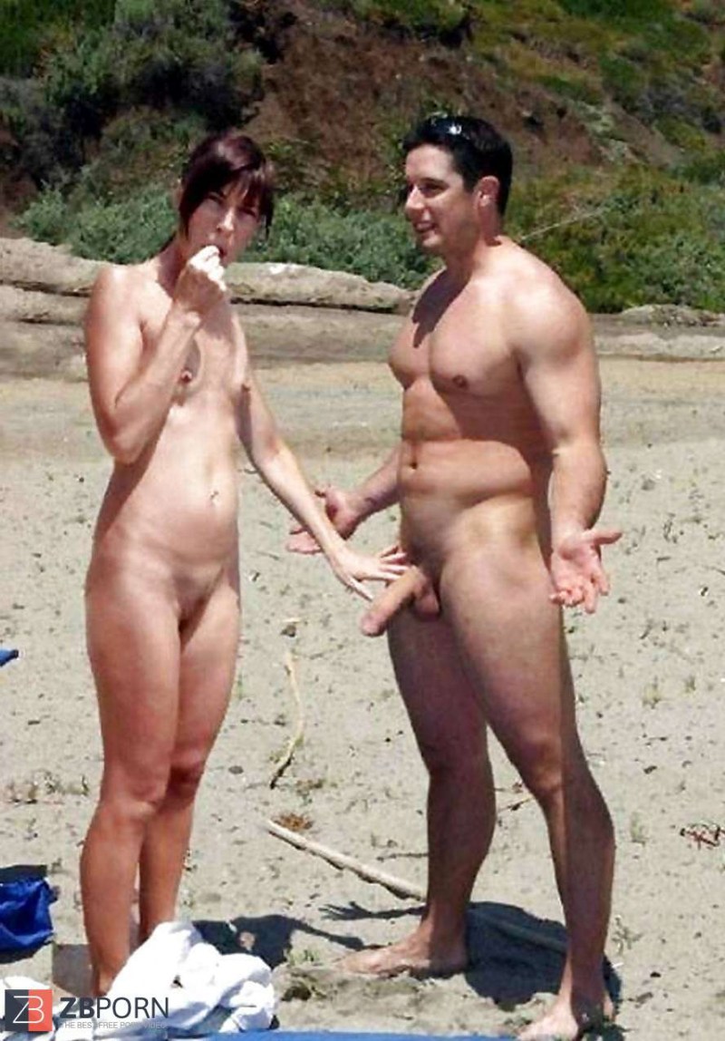 Naked men and women on the beach