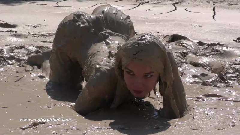 Naked swimming in the mud
