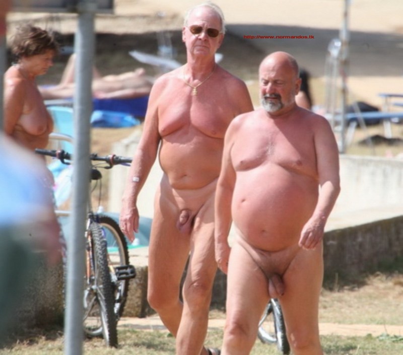 Naked elderly men on the beach
