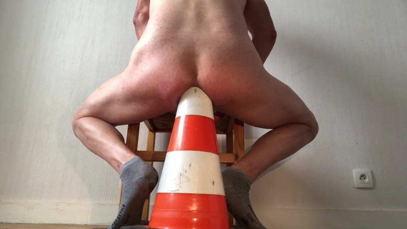 Naked women with a bottle in a vagina