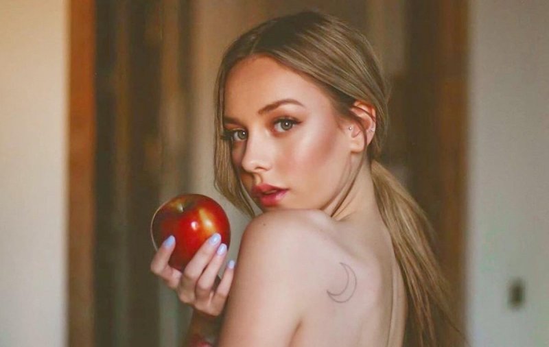 A girl in latex jumps