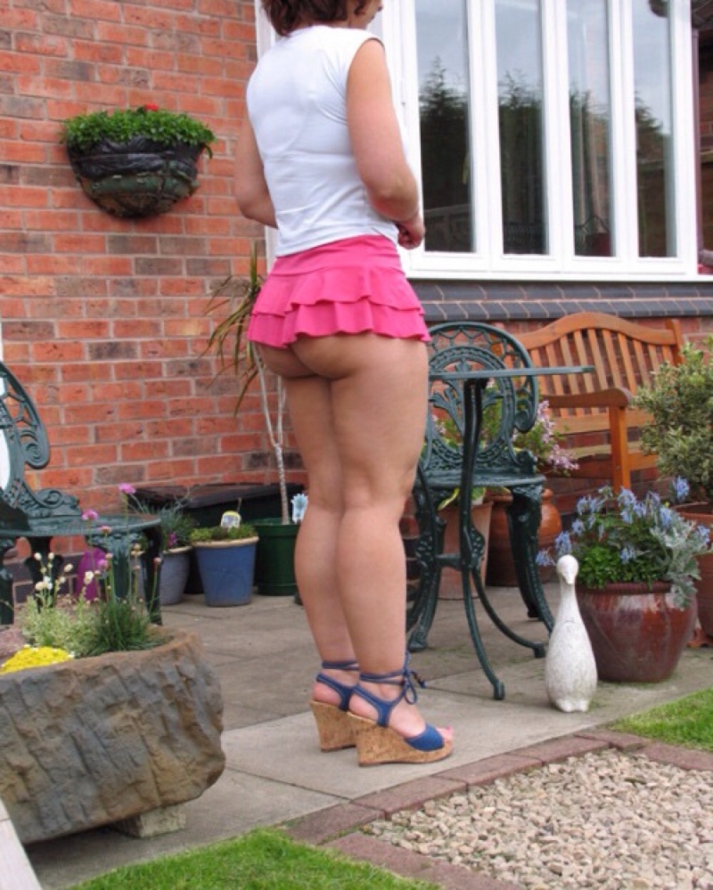 Naked in micro skirts on the street