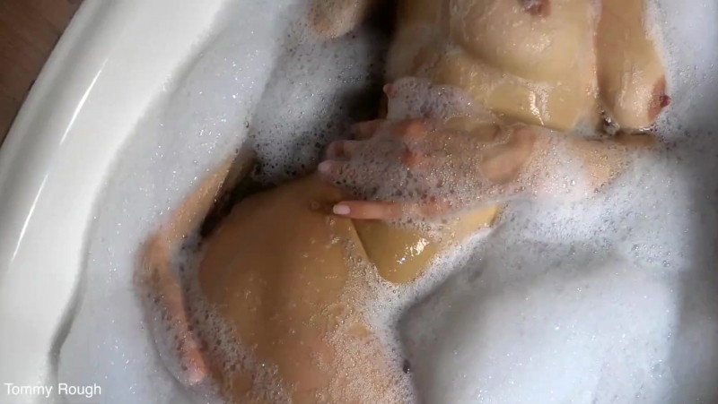 Naked Japanese women in a bath with foam